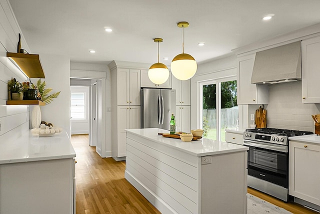 2456 Lantern St, Charleston, SC 29414 - kitchen featuring stainless steel appliances, premium range hood, light wood finished floors, backsplash, and recessed lighting