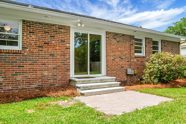 2456 Lantern St, Charleston, SC 29414 - entrance to property featuring brick siding and a patio
