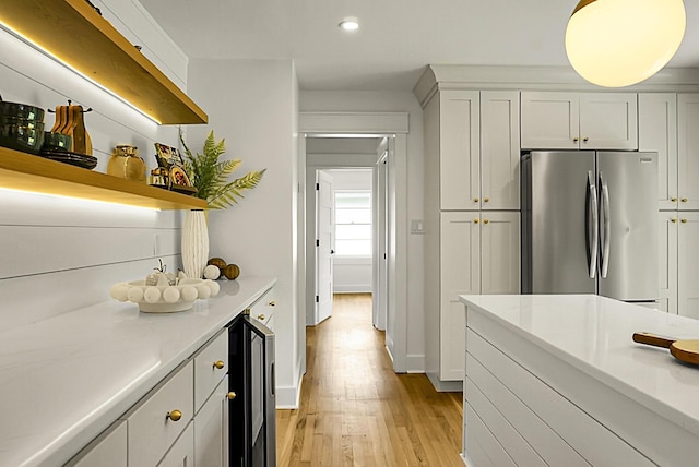 2456 Lantern St, Charleston, SC 29414 - kitchen featuring freestanding refrigerator, recessed lighting, light wood-style floors, light countertops, and wine cooler