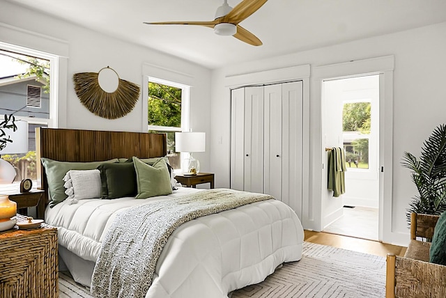2456 Lantern St, Charleston, SC 29414 - bedroom with light wood-style floors, a closet, and a ceiling fan