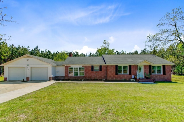 ranch-style house featuring brick siding, an attached garage, driveway, and a front yard