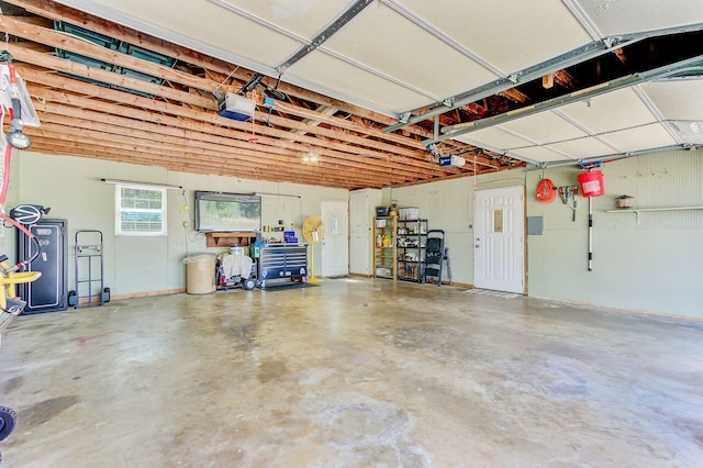 garage featuring a garage door opener