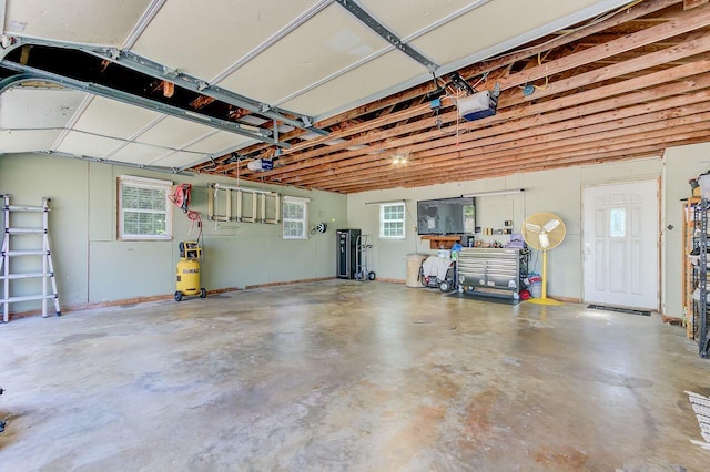 garage featuring a garage door opener