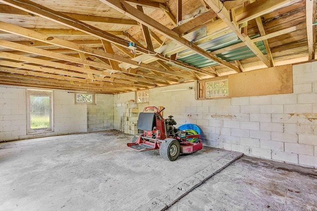 garage featuring concrete block wall