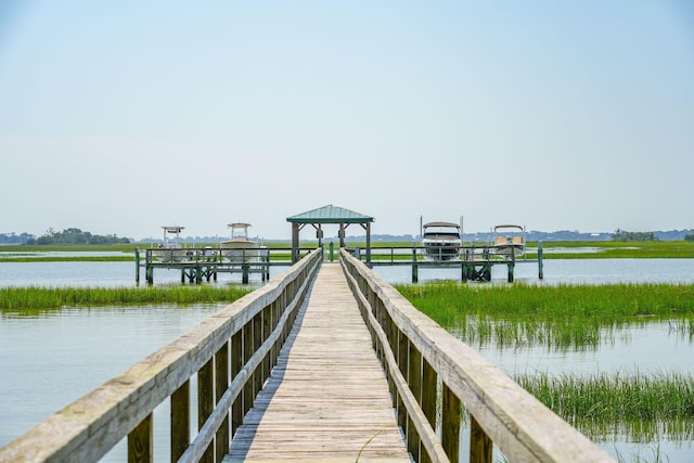 dock area featuring a water view