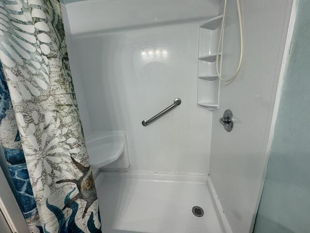 full bath with a stall shower