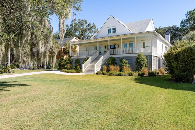 view of front of home with a front lawn and covered porch