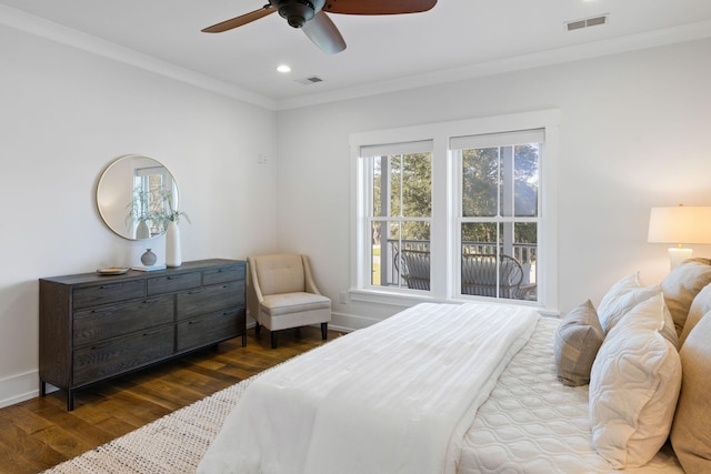 bedroom featuring ceiling fan, crown molding, and wood-type flooring