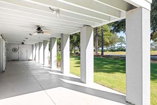 view of patio featuring ceiling fan