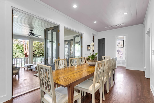 dining space featuring ornamental molding, dark hardwood / wood-style floors, plenty of natural light, and ceiling fan