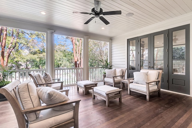 sunroom / solarium with ornate columns and wooden ceiling