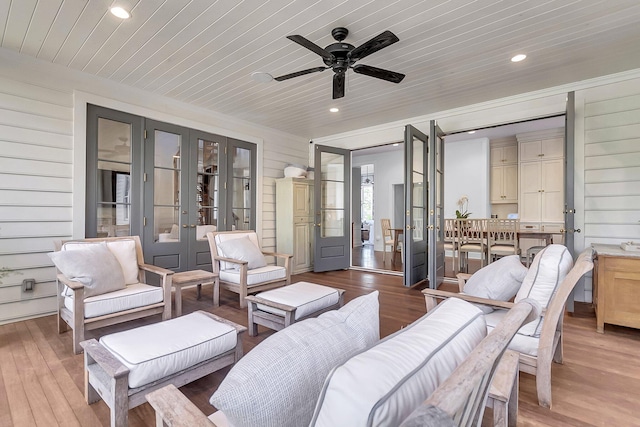 interior space featuring french doors, wood ceiling, and ceiling fan