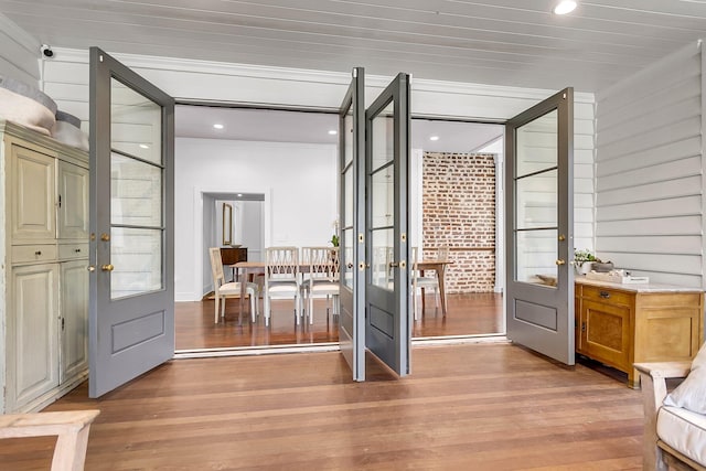 doorway to outside featuring light hardwood / wood-style flooring