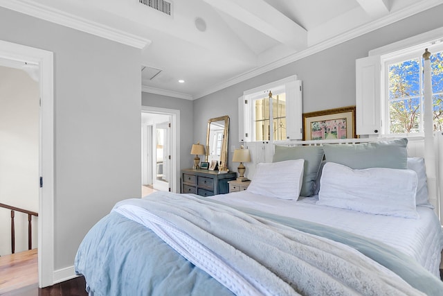 bedroom with beam ceiling, crown molding, and dark hardwood / wood-style floors