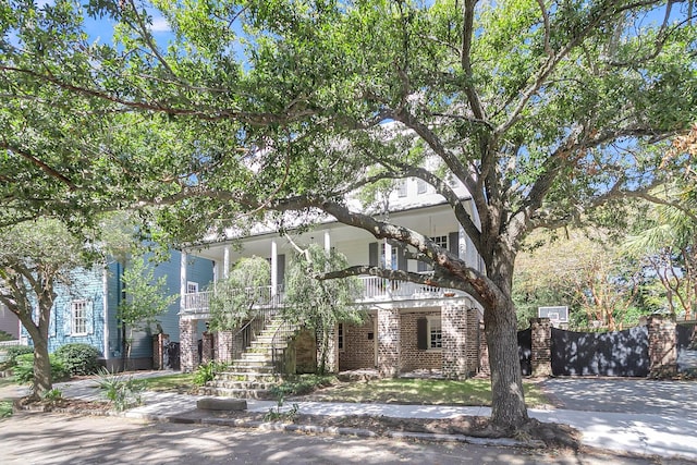 obstructed view of property featuring a porch