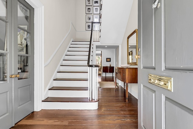 foyer entrance with dark wood-type flooring