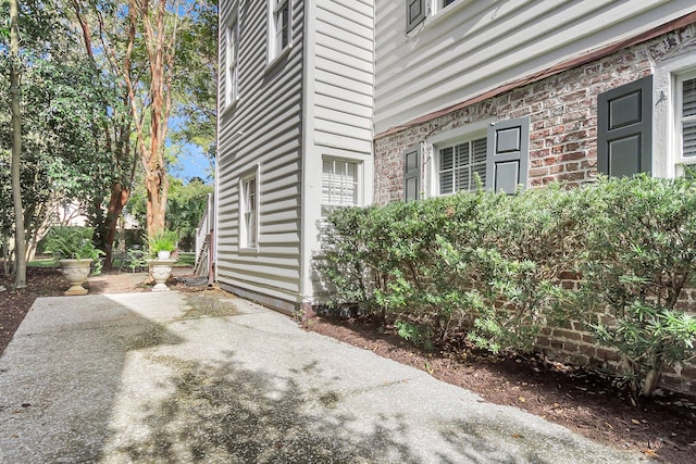 view of home's exterior with a patio area