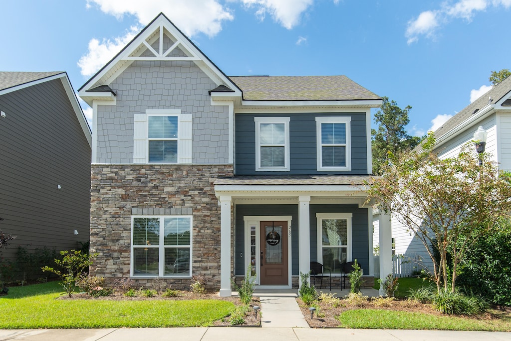 craftsman-style home with covered porch