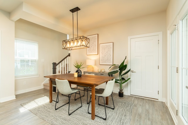 dining area with light wood-type flooring