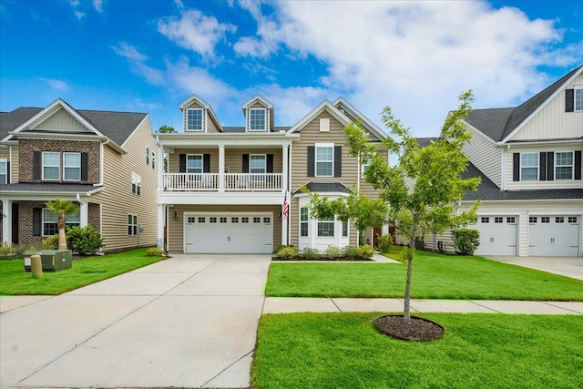 view of front of property with a garage and a front lawn