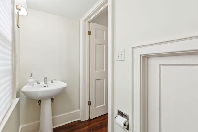 bathroom with hardwood / wood-style flooring