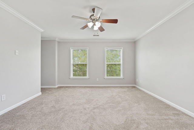 489 Dolphin Dr, Summerville, SC 29485 - spare room featuring crown molding, carpet flooring, a ceiling fan, and baseboards