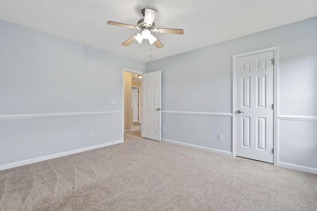 489 Dolphin Dr, Summerville, SC 29485 - unfurnished bedroom with carpet, baseboards, and a ceiling fan