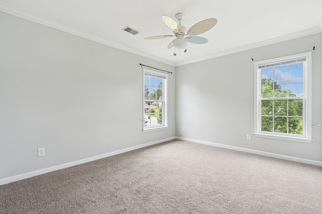 489 Dolphin Dr, Summerville, SC 29485 - spare room featuring crown molding, healthy amount of natural light, baseboards, and ceiling fan