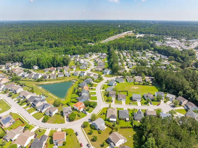 489 Dolphin Dr, Summerville, SC 29485 - aerial view of property's location with a forest, a large body of water, and nearby suburban area