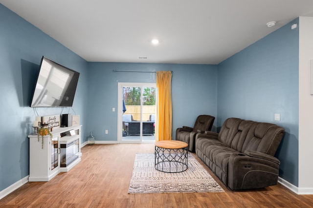 671 Silver Spruce St, Summerville, SC 29486 - living area with wood finished floors and baseboards