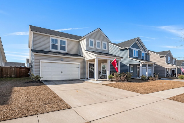 view of front of home with a porch and a garage