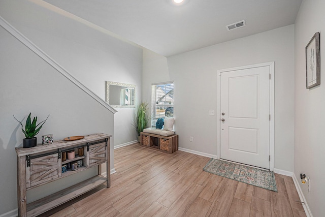 entrance foyer with light hardwood / wood-style floors