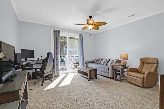 office area with carpet flooring, crown molding, and ceiling fan