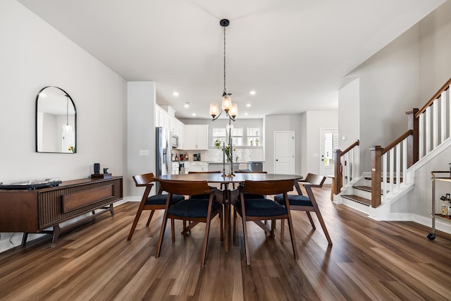 582 Mclernon Trce, Johns Island, SC 29455 - dining space featuring dark wood-type flooring, recessed lighting, stairs, baseboards, and a chandelier