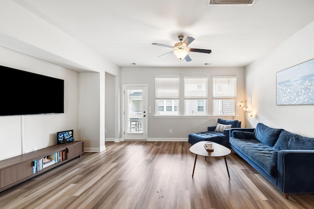 582 Mclernon Trce, Johns Island, SC 29455 - living area featuring ceiling fan, wood finished floors, and baseboards