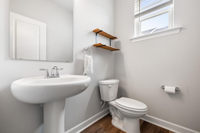 582 Mclernon Trce, Johns Island, SC 29455 - half bath with baseboards, wood finished floors, and toilet