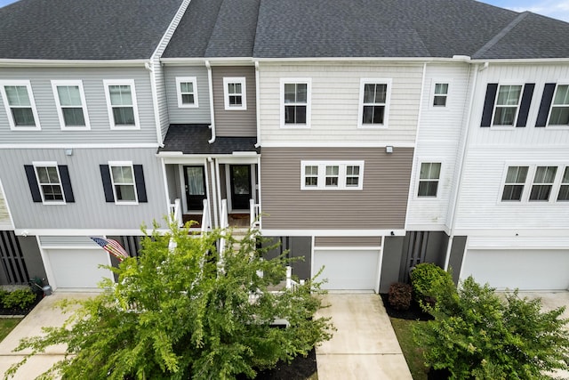 582 Mclernon Trce, Johns Island, SC 29455 - view of front of house featuring an attached garage and a shingled roof