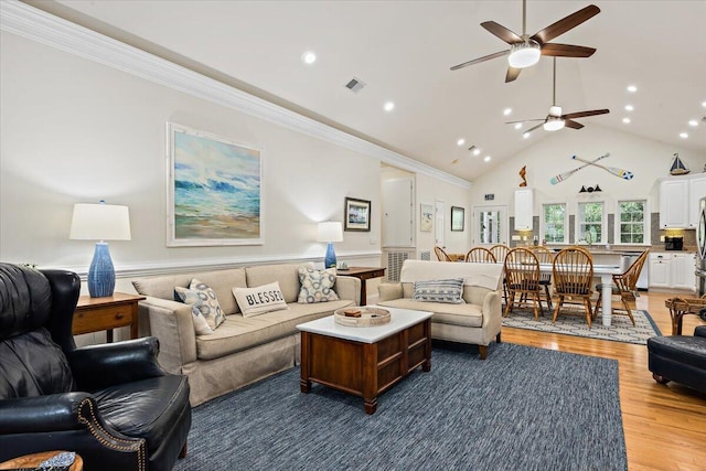 1604 Jungle Rd, Edisto Island, SC 29438 - living area featuring wood finished floors, a ceiling fan, recessed lighting, high vaulted ceiling, and ornamental molding