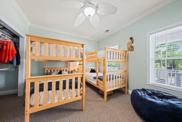 1604 Jungle Rd, Edisto Island, SC 29438 - carpeted bedroom with crown molding and a ceiling fan