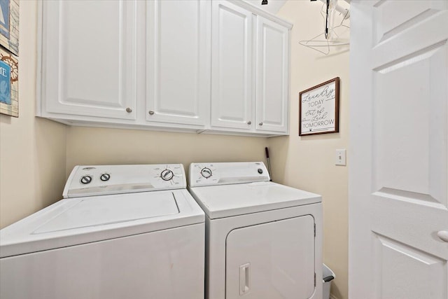 1604 Jungle Rd, Edisto Island, SC 29438 - laundry room with independent washer and dryer and cabinet space