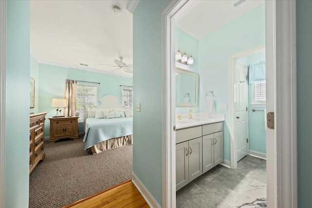 1604 Jungle Rd, Edisto Island, SC 29438 - full bath with vanity, ensuite bathroom, and a ceiling fan