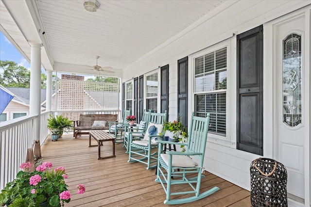 1604 Jungle Rd, Edisto Island, SC 29438 - porch featuring ceiling fan and an outdoor living space
