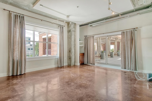 empty room featuring concrete floors