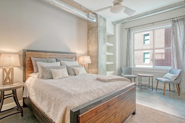 bedroom featuring concrete floors