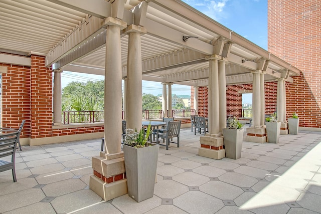 view of patio featuring a pergola