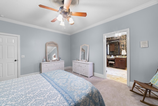 bedroom with ornamental molding, connected bathroom, light carpet, and ceiling fan