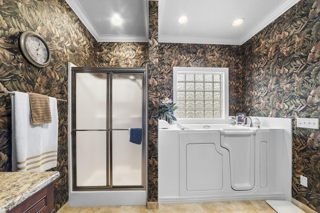 bathroom with ornamental molding and a bathtub