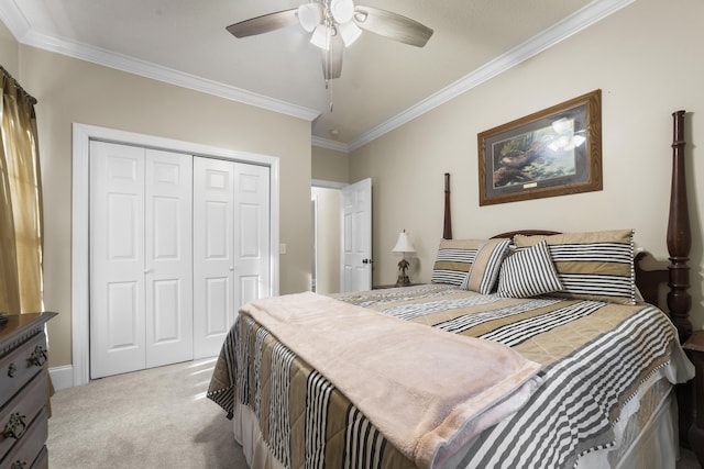 bedroom with ornamental molding, light colored carpet, a closet, and ceiling fan