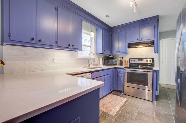 kitchen with stainless steel range with electric cooktop, backsplash, sink, blue cabinets, and tile floors