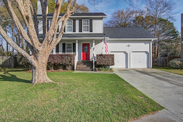 front facade with a front lawn and a garage